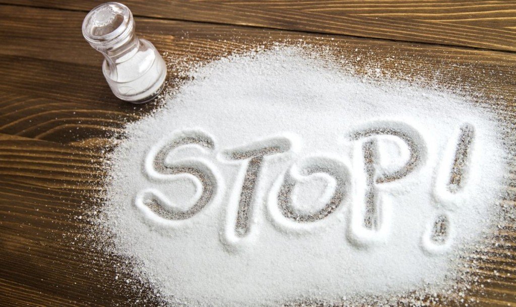 What are the harmful effects of excess salt and sodium in the human body